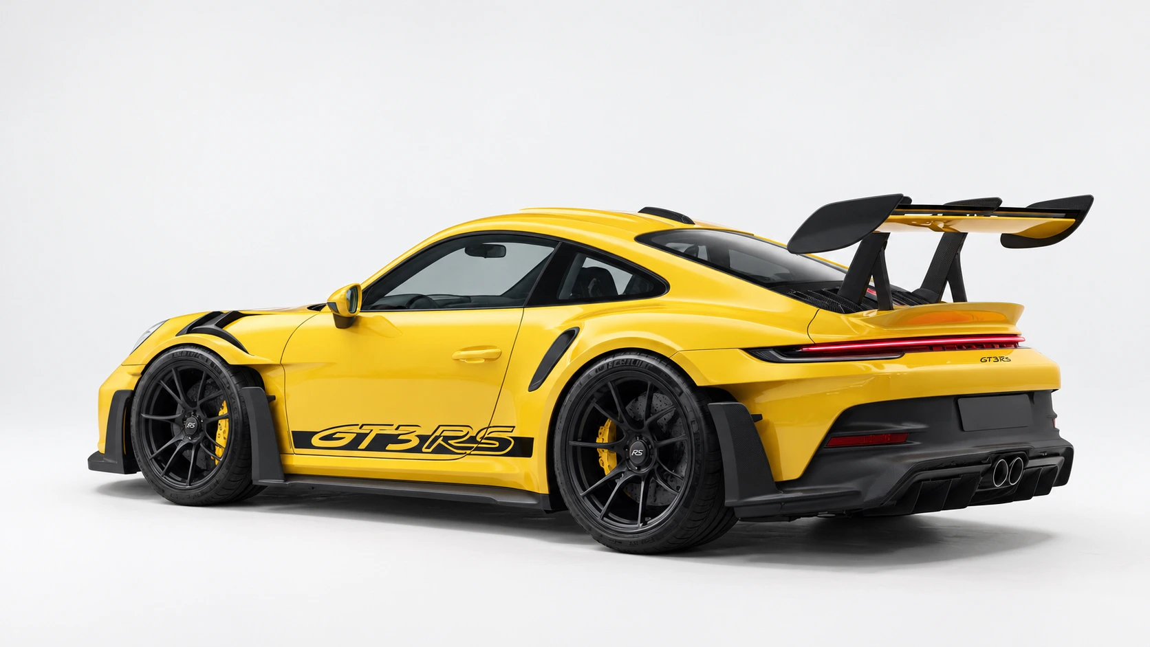 Yellow Porsche 911 GT3 RS, freshly detailed, in a bright studio